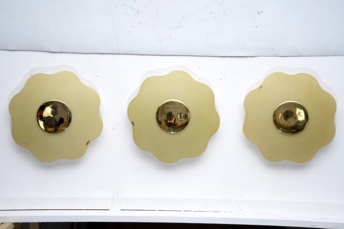 Set of three wall lamps by Fabbian in murano glass and brass. Italy 1970s