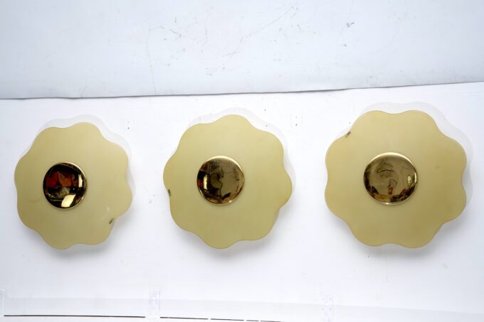 Set of three wall lamps by Fabbian in murano glass and brass. Italy 1970s