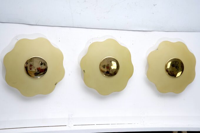 Set of three wall lamps by Fabbian in murano glass and brass. Italy 1970s